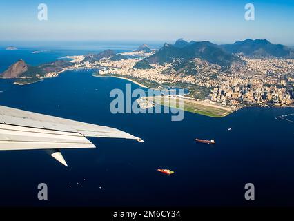 The span of the aircraft over the city Stock Photo