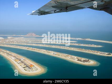 Flying over the island palm tree in Dubai. Stock Photo