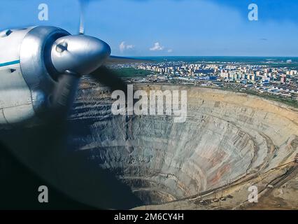 The view from the window of a passenger plane during the flight over the mine Stock Photo