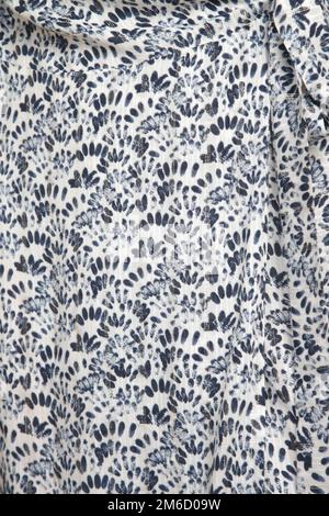 Close up of textured linen fabric with geometric print	 Close up of textured linen fabric with geometric print Stock Photo