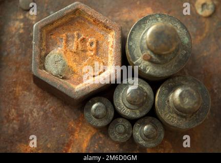 Weights for retro scales. Vintage weight for a balance scale Balance weights Stock Photo Alamy