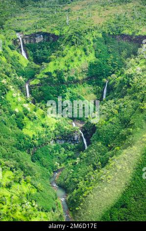 Cascade of cascades in the greenness of Kauai, US Stock Photo