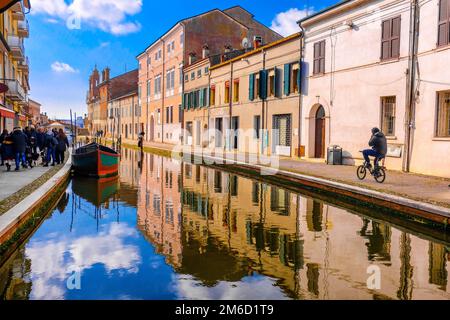 Comacchio vale Ferrara province Emilia Romagna region cycling in Italy blue sky over canal Stock Photo