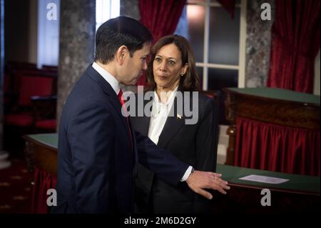 Vice President Kamala Harris reacts while touring the Armand J