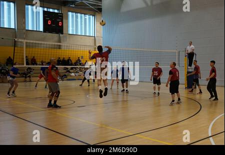 Manuel Barriga, 589th Brigade Support Battalion (BSB), goes for a spike during the 2022 Installation Management Command-Europe Unit Level Volleyball Tournament championship game April 24 at the Katterbach Fitness Center. Bavaria’s 589th BSB beat Vicenza’s Southern European Task Force, Africa in two sets, 26-24and 25-22, to win the tournament held April 22-24. Stock Photo