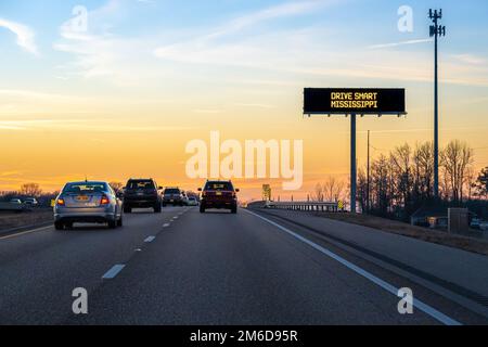'Drive Smart Mississippi' message board sign along I-269 at sunset in Hernando, Mississippi, just south of Memphis, Tennessee. (USA) Stock Photo
