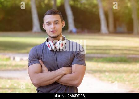 Young latin man runner running jogging sports training fitness Stock Photo