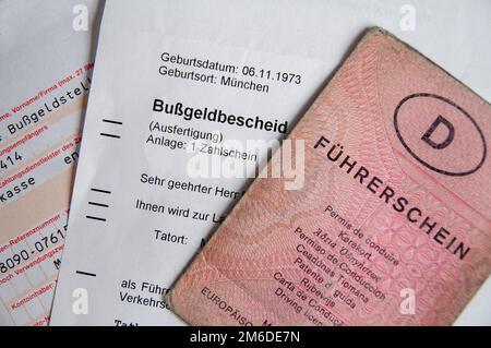 German driving license FÃ¼hrerschein and Police fine BuÃŸgeldbescheid Stock Photo