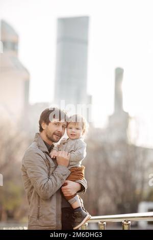 Young girl and child in a park Stock Photo