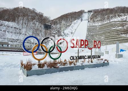 Hokkaido, Japan  - December 21, 2022 : Sapporo OLYMPIC Sign at the foot of Okurayama Jump Ski Stadium in Sapporo City, Hokkaido, Japan Stock Photo