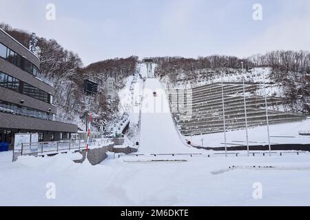 Hokkaido, Japan  - December 21, 2022 : The Okurayama Ski Jump Stadium in Sapporo City is a ski jumping venue and view point located in the Miyanomori Stock Photo