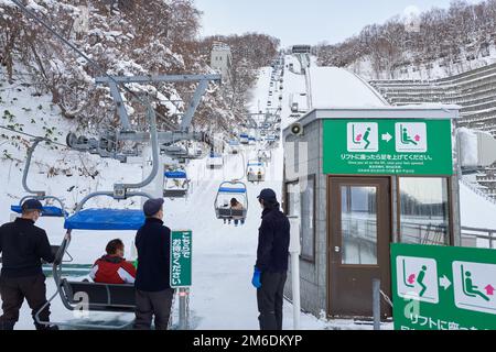 Hokkaido, Japan  - December 21, 2022 : The Okurayama Ski Jump Stadium in Sapporo City is a ski jumping venue and view point located in the Miyanomori Stock Photo