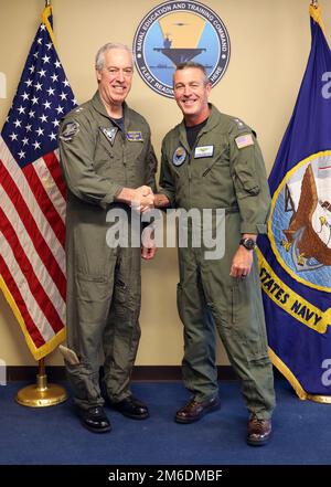 220425-N-QG416-001 PENSACOLA, Fla. (April 25, 2022) - Rear Adm. John Meier, commander, Naval Air Force Atlantic, visited Naval Air Station Pensacola April 25. Meier met with Rear Adm. Pete Garvin, commander, Naval Education and Training Command (NETC) and received a brief on enlisted aviation training. Stock Photo