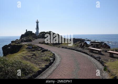 Cape Nagasaki, or Nagasakibana, is located at the southernmost point of the Satsuma peninsula. There is a lighthouse surrounded by the East China Sea Stock Photo