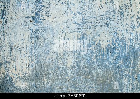 Grunge blue fade painted concrete surface closeup as background Stock Photo