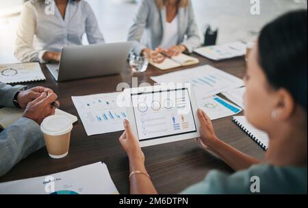Digital tablet, meeting and business people with paperwork planning a project with data, graphs and statistics. Technology, documents and team working Stock Photo