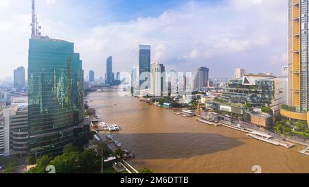 Aerial view Bangkok city skyline over Chao Praya River Stock Photo