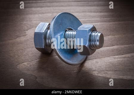 Close up image of bolt washer construction nut and screwbolt. Stock Photo
