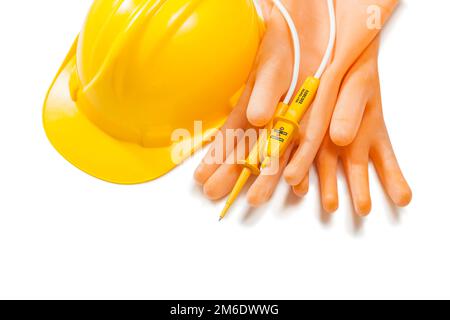 dielectric gloves with electric tester and yellow helmet isolated on white Stock Photo