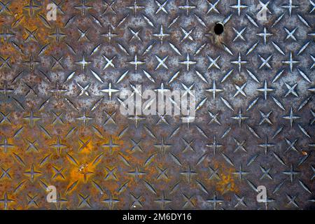 Rusty metal foot plate Stock Photo