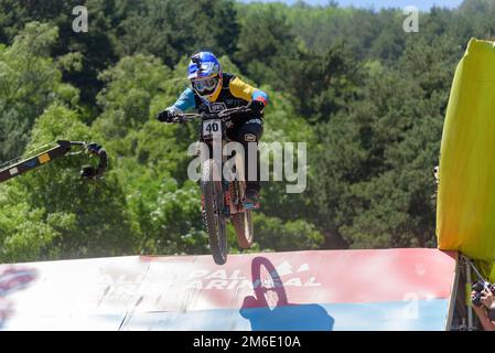 VALLNORD, ANDORRA  - JULY 5 2019:  CYCLIST in the MERCEDES-BENZ UCI MTB WORLD CUP 2019 - DHI Vallnor Stock Photo