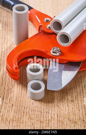 cutted pipes and pipe cutter Stock Photo