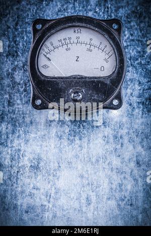 Electric instrument of measurement on metallic surface copyspace electricity concept. Stock Photo