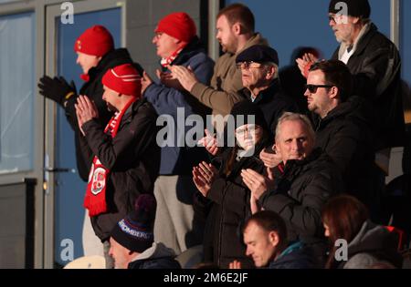 Crawley Fans in the away stand at Rodney Parade during the EFL League Two match between Newport County and Crawley Town at Rodney Parade. 2nd January 2023 Stock Photo