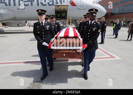 Corporal David B. Milano, MIA, was lost in action during the Korean War on December 2, 1950. After 71 years, he will be repatriated back to the United States and reunited with his family. An Honor Guard made up of members of the Utah National Guard conduct an Honorable Carry at the Salt Lake City International Airport, April 26, 2022. Milano was born in Chicago, Illinois on Dec. 23, 1932, to Albert and Lida Milano. His family relocated to Utah, where Milano will be laid to rest next to his mother, sister and brother-in-law at Evergreen Memorial Park, 100 Monroe Blvd., Ogden, Utah. Stock Photo