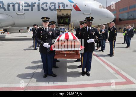 Corporal David B. Milano, MIA, was lost in action during the Korean War on December 2, 1950. After 71 years, he will be repatriated back to the United States and reunited with his family. An Honor Guard made up of members of the Utah National Guard conduct an Honorable Carry at the Salt Lake City International Airport, April 26, 2022. Milano was born in Chicago, Illinois on Dec. 23, 1932, to Albert and Lida Milano. His family relocated to Utah, where Milano will be laid to rest next to his mother, sister and brother-in-law at Evergreen Memorial Park, 100 Monroe Blvd., Ogden, Utah. Stock Photo