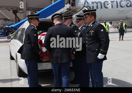 Corporal David B. Milano, MIA, was lost in action during the Korean War on December 2, 1950. After 71 years, he will be repatriated back to the United States and reunited with his family. An Honor Guard made up of members of the Utah National Guard conduct an Honorable Carry at the Salt Lake City International Airport, April 26, 2022. Milano was born in Chicago, Illinois on Dec. 23, 1932, to Albert and Lida Milano. His family relocated to Utah, where Milano will be laid to rest next to his mother, sister and brother-in-law at Evergreen Memorial Park, 100 Monroe Blvd., Ogden, Utah. Stock Photo