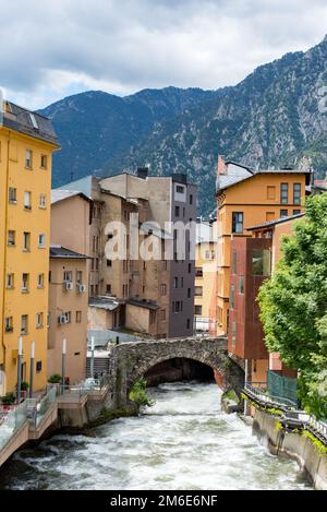 ESCALDES-ENGORDANY, ANDORRA - 2020 juny 8: River Valira on Engordany Bridge and houses view in a sno Stock Photo