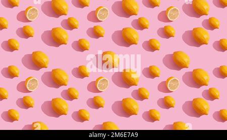 Seamless continuous pattern of yellow lemons on pink background. Minimalist concept of fresh citrus fruit Stock Photo