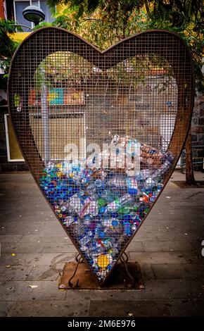 Heart shaped recycling bottle container in Morro Jable, Fuerteventura Stock Photo