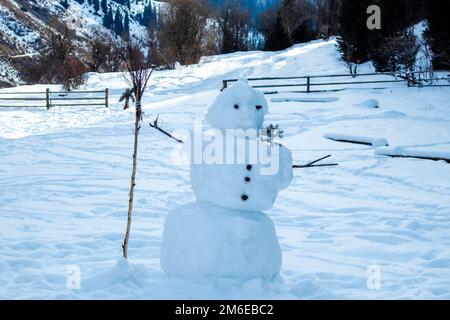 the snowman. a big snowman with a broom. winter fun Stock Photo