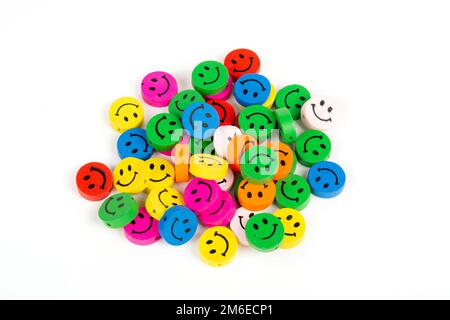 Sewing Colorful wooden buttons on white background. Stock Photo