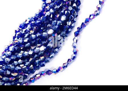 Beautiful blue Glass Sparkle Crystal Isoalted Beads on white background. Stock Photo