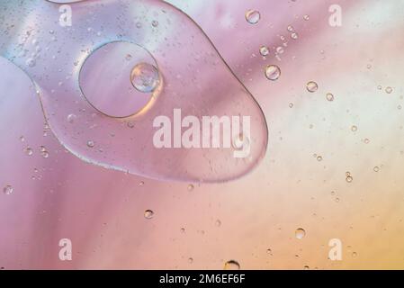 Defocused pastel colored abstract background picture made with oil, water and soap Stock Photo