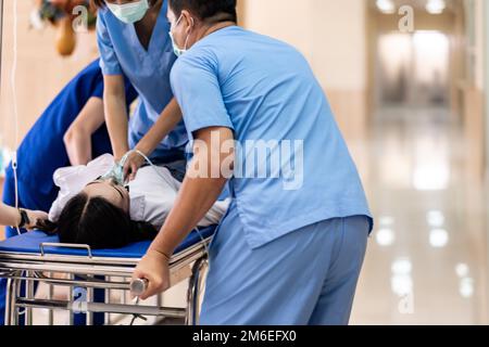 Close Up Medical Team Do CPR To Seriously Injured Patient With Oxygen ...