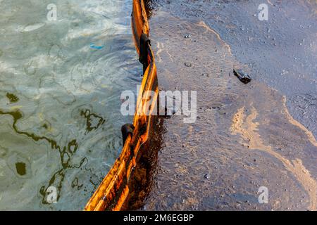 Ecological catastrophy. Close-up. Spill of oil products into the sea. Poisonous oil products float o Stock Photo