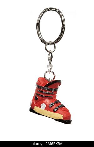 Key rings of various shapes, figures on a white background. Gift for Christmas, Easter, Valentine's Day, Holiday Stock Photo