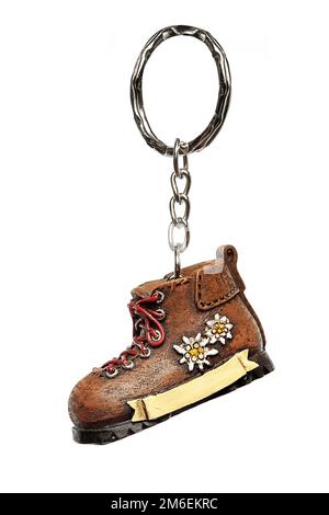 Key rings of various shapes, figures on a white background. Gift for Christmas, Easter, Valentine's Day, Holiday Stock Photo