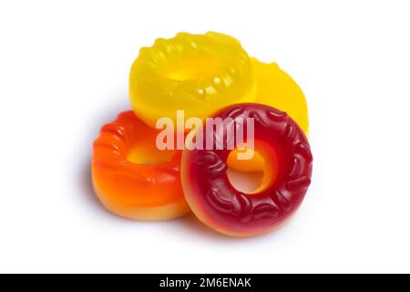 Multicolored jelly candy donuts on a white background. Stock Photo