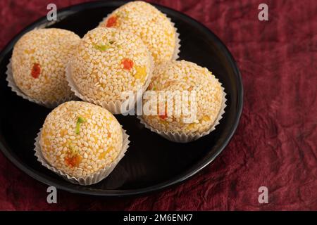 Winter Season Special Traditional Punjabi Mithai Til Bhugga Or Til Bugga Is Made Of Dry Roasted Sesame Seeds With Mava, Khoya, Jaggery, Mawa, Gud, Des Stock Photo