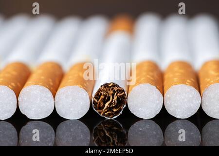 multi cigarette smoker A 1955 device for smoking a whole pack of cigarettes at once : r/interestingasfuck Stacked Filter Cigarettes, Macro Closeup