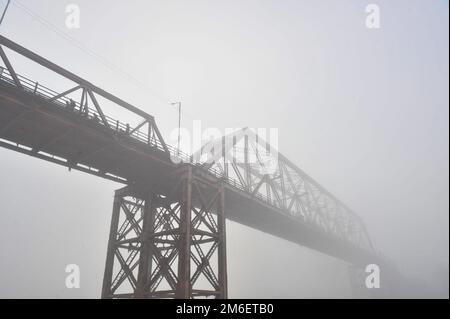 Non Exclusive: 04 January 2023 In Sylhet-Bangladesh: Keen Bridge in Sylhet in deep foggy winter morning in Sylhet, Bangladesh. Cold wave is blowing ac Stock Photo