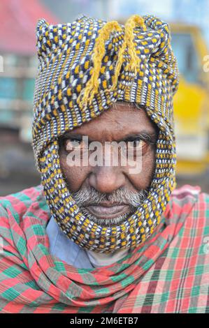 Non Exclusive: 04 January 2023 In Sylhet-Bangladesh: Portrait of an Aged people in deep foggy winter morning in Sylhet, Bangladesh. Cold wave is blowi Stock Photo