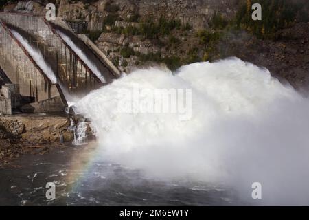 Kolyma hydroelectric power station in Magadan region, Russia. Spillway from the dam of the hydroelectric power station. A huge s Stock Photo