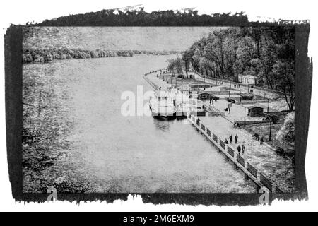 Black and white vintage photograph of the embankment of the city park. Stock Photo