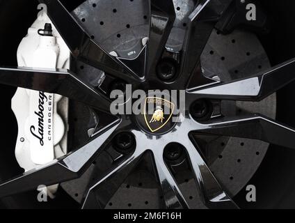 RALEIGH,NC/USA - 09-04-2019: Closeup of a Lamborghini sports car wheel and tire, with the bull logo in the center Stock Photo